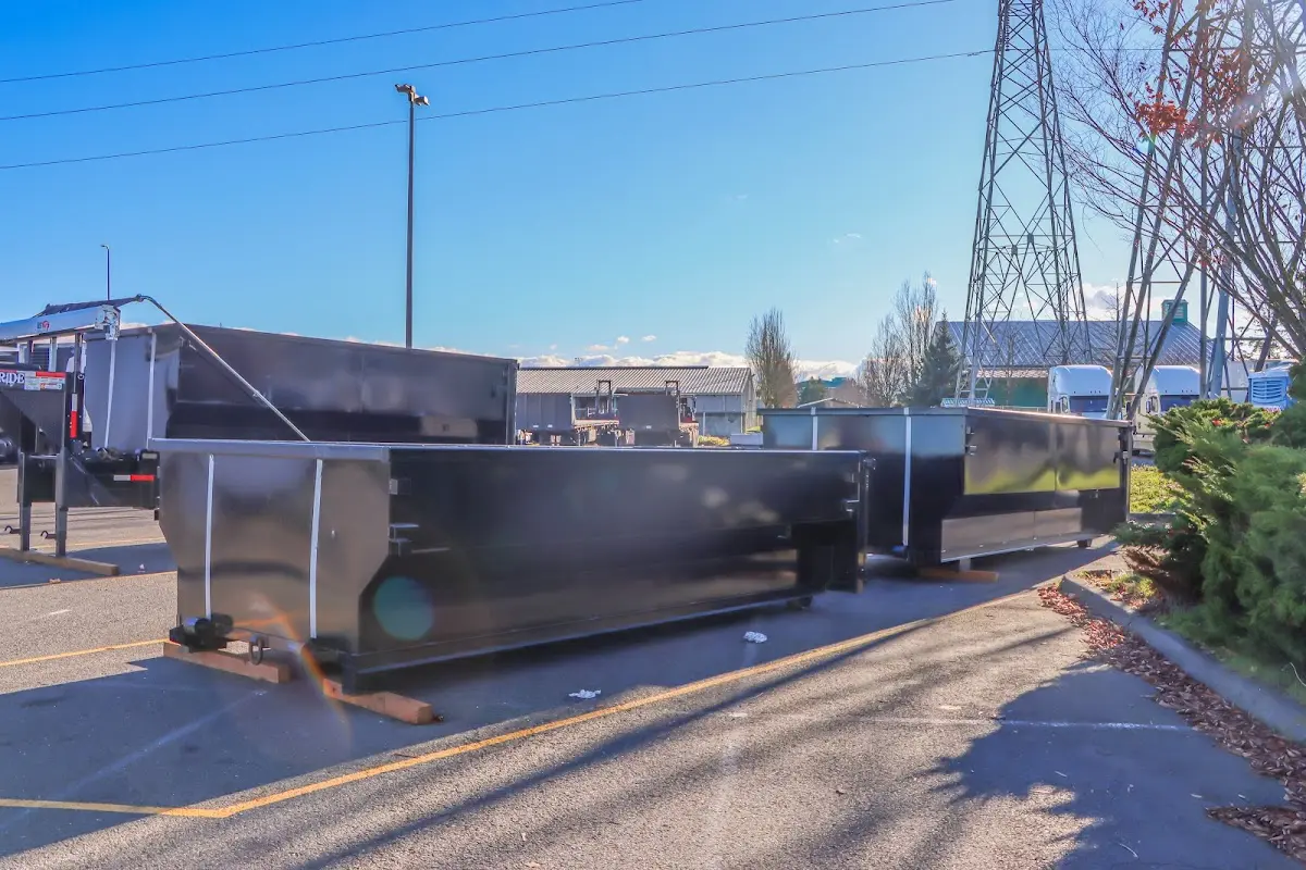 Roll-off dumpster ready for waste disposal at job site for Demolition Dumpster Rental in Prosper